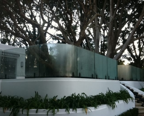 Frameless curved glass pool fence Bayview